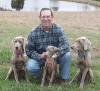 Tom Ingala with his dogs